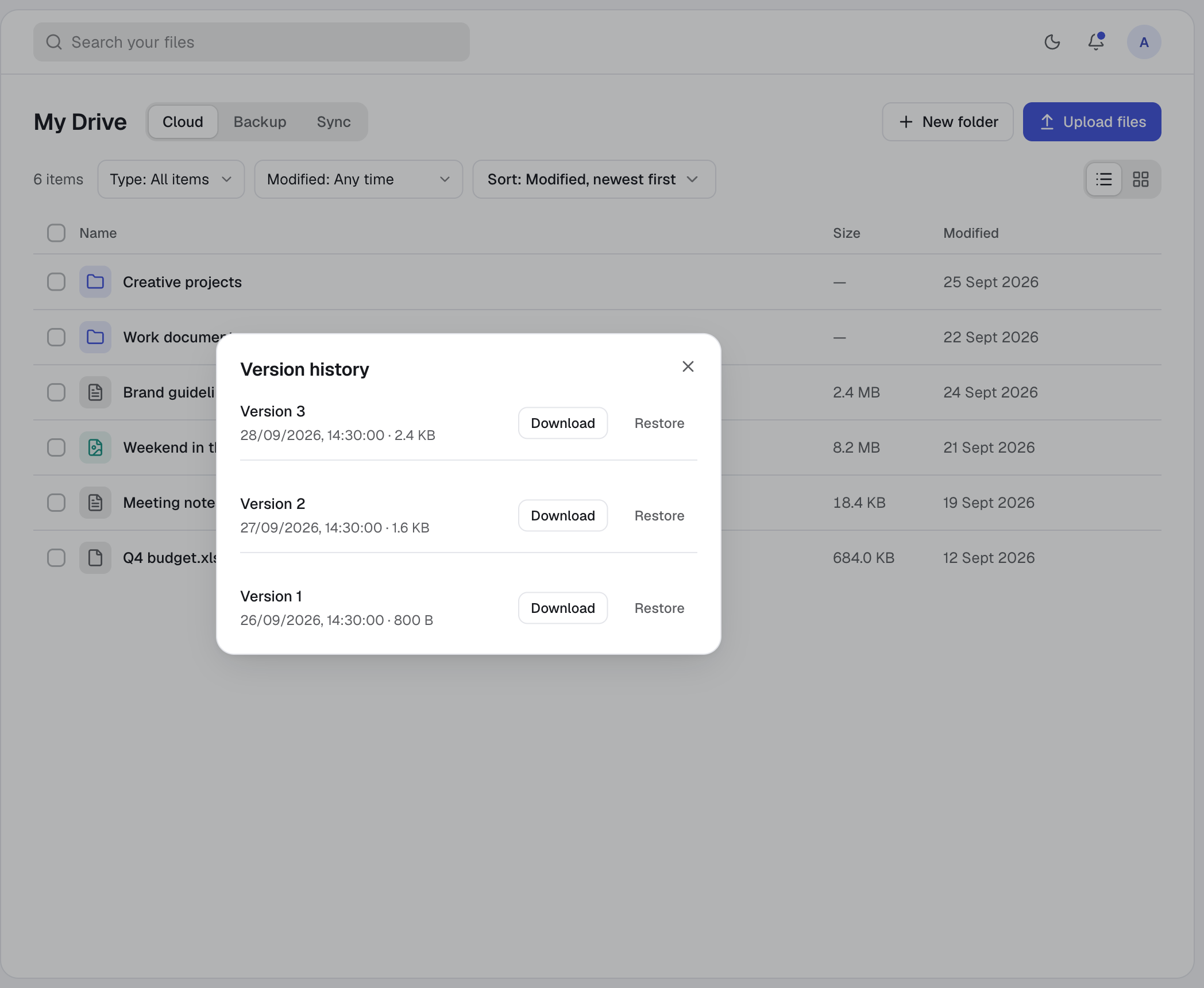 The version history of a file, with Download and Restore for each version